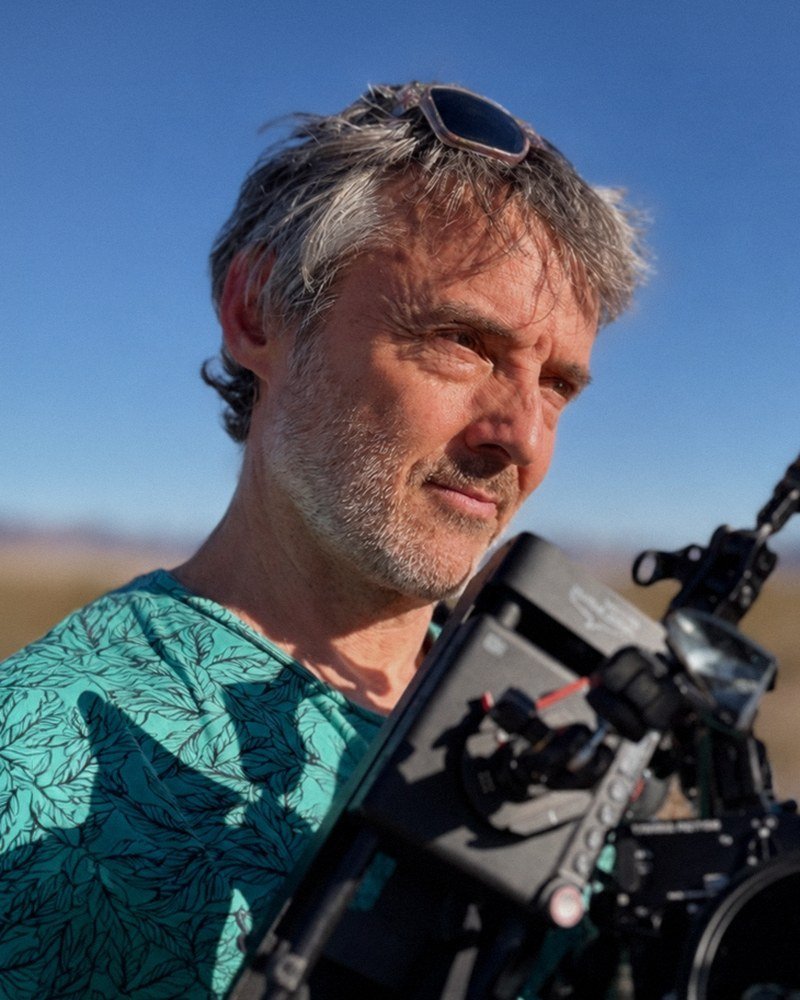 Heath Cozens with his camera rig in the desert